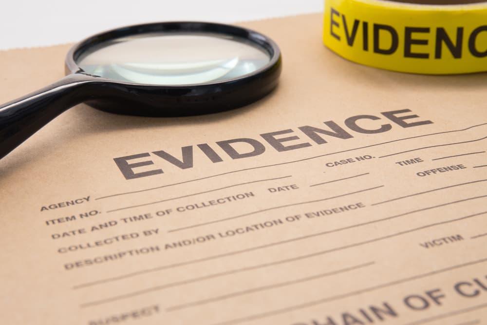 Evidence Envelope and Magnifying Glass
