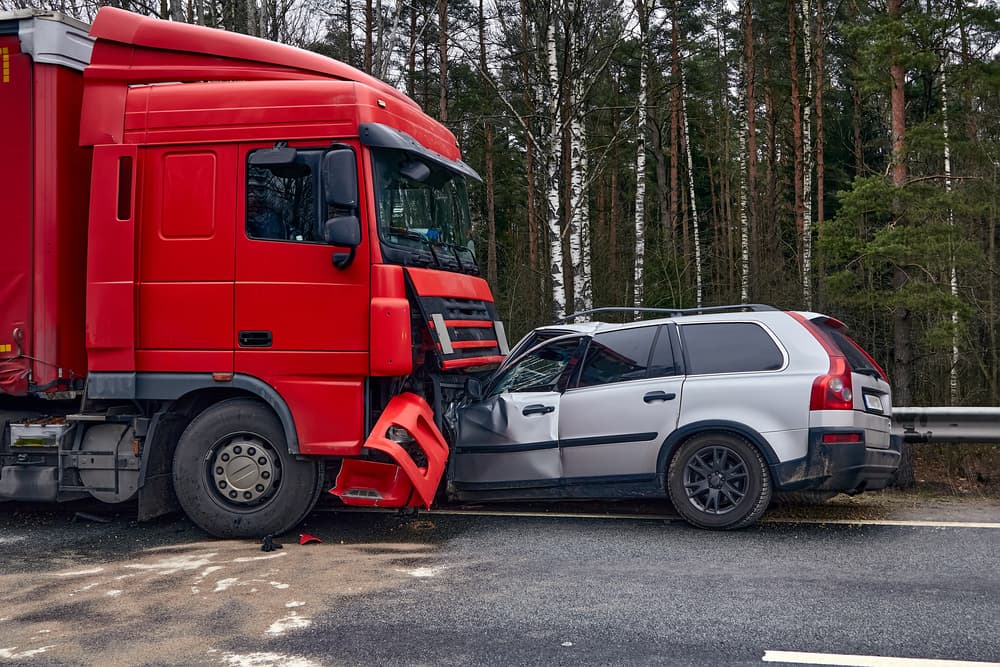 car after a collision with a heavy truck,