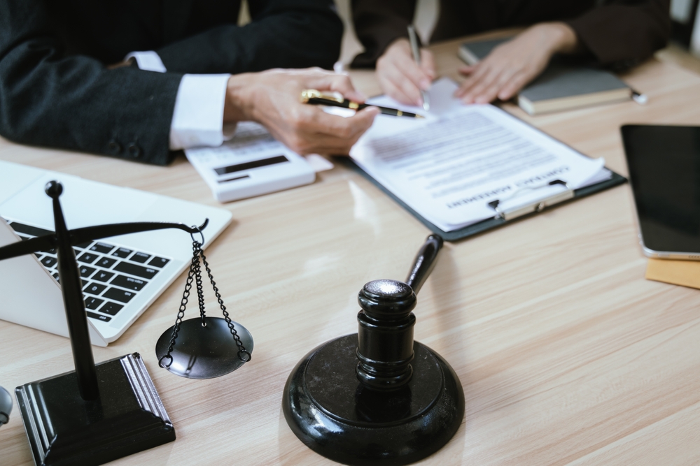 Image showing a personal injury lawyer supporting a client with PTSD through legal guidance and case preparation.