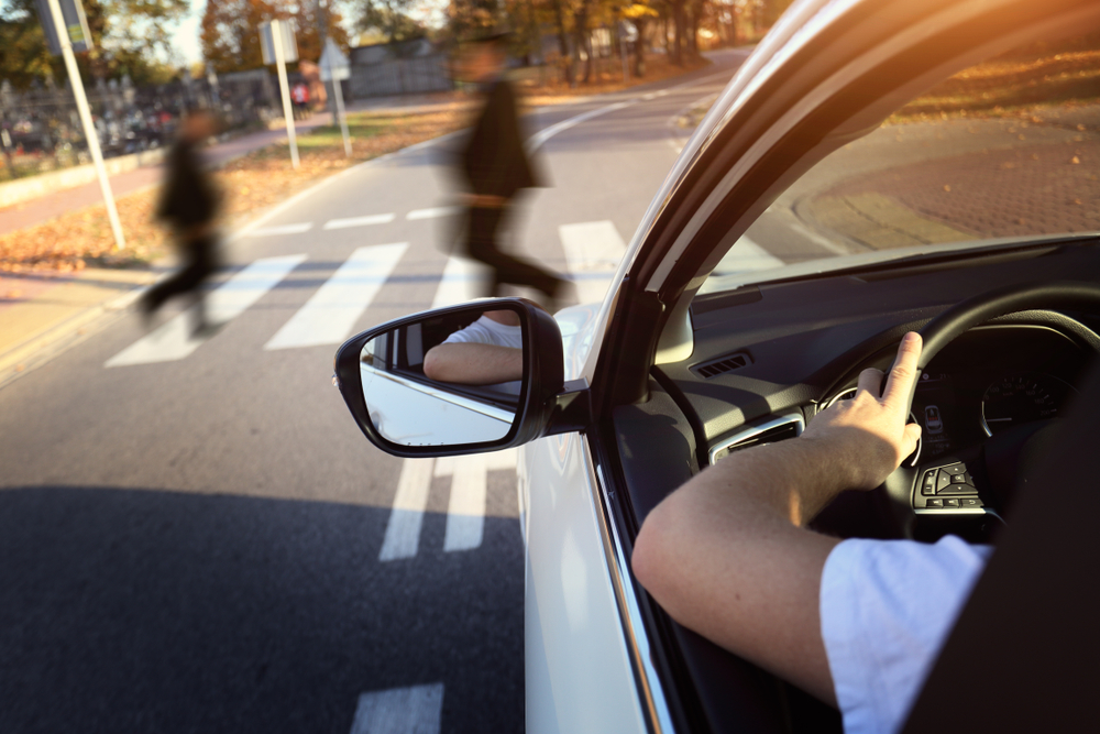 Illustration showing various types of pedestrian accidents including crosswalks, intersections, and lots.